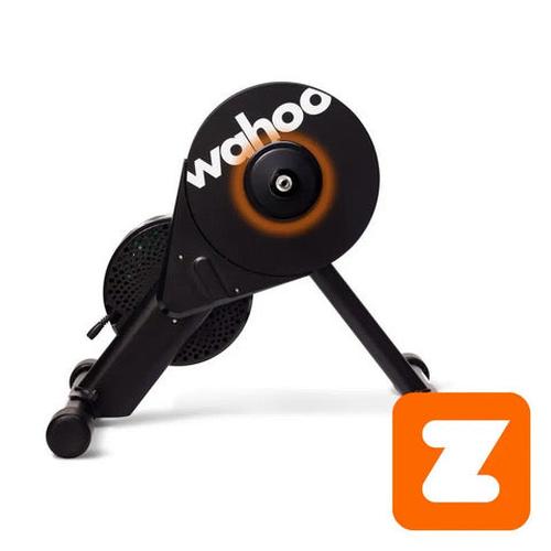Black Wahoo Kickr Core smart trainer with orange accent, featuring a sturdy metal frame and Zwift Cog branding.